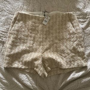 Express boucle suit shorts. Never worn. Size 12. Matching jacket also available.